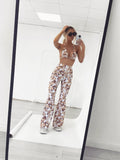 HIGH WAISTED FLARE TROUSERS - MARBELLA LEOPARD